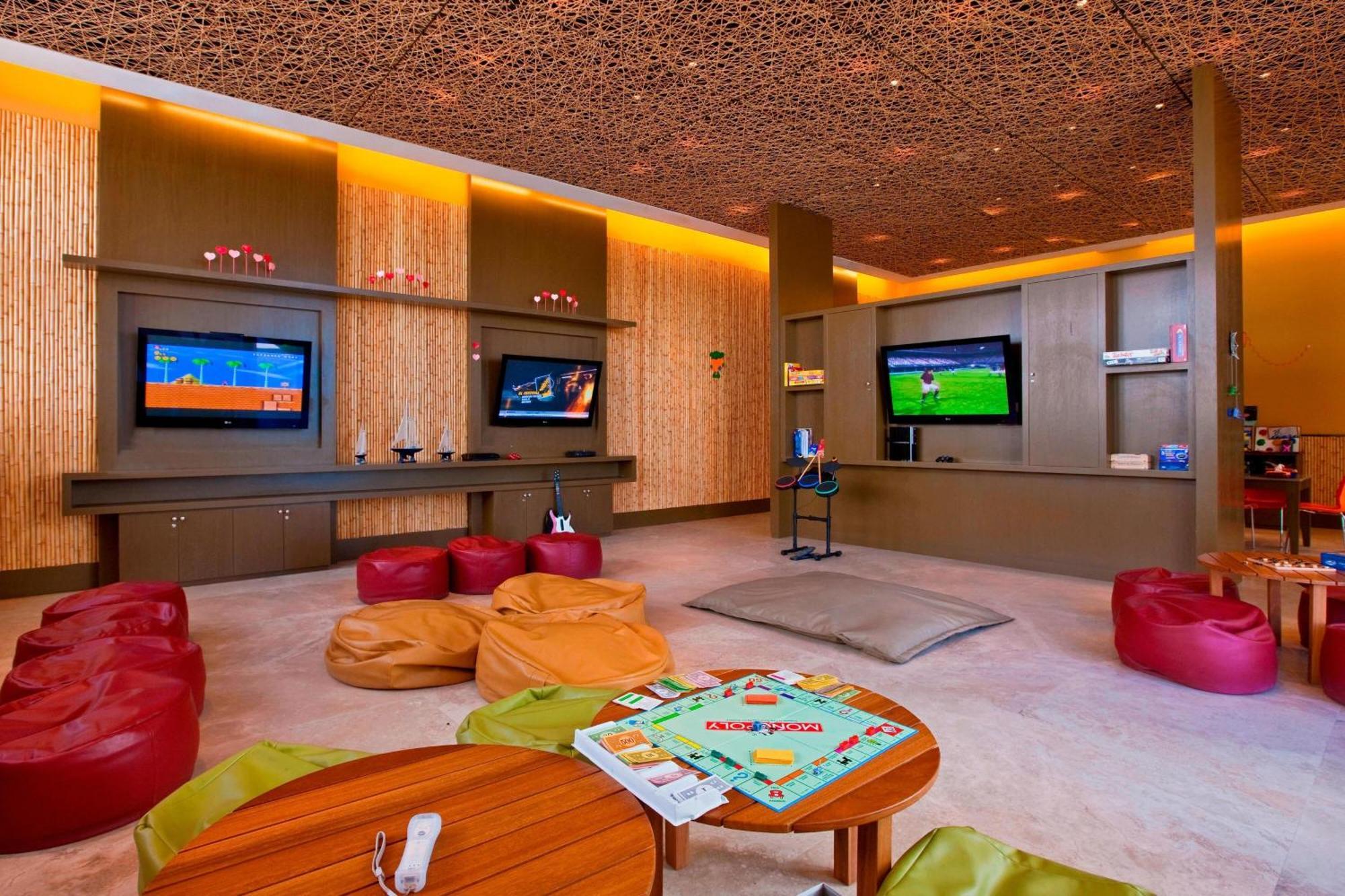 โรงแรมปารากัส อะ ลักชัวรี คอลเลคชั่น รีสอร์ต ปารากัส ภายนอก รูปภาพ The game room at the club